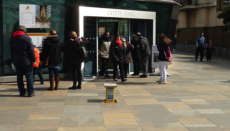 On demand access to power and other services provided in the pedestrianised spaces of the Cutty Sark attraction by using a retractable service unit from Pop Up Power Supplies.